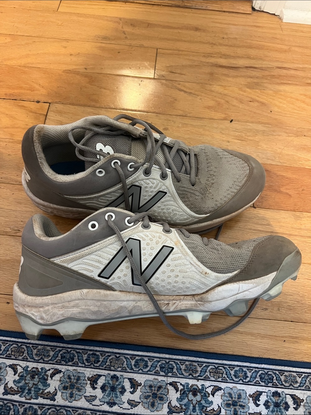 New Balance Men’s Gray and White Athletic Cleats